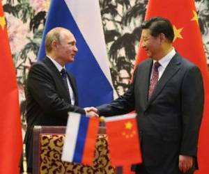 El presidente chino, Xi Jinpingy su par ruso Vladimir Putin. (Foto: AFP)
