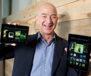 VAN HORN, TEXAS - JULY 20: Jeff Bezos laughs as he speaks about his flight on Blue Origins New Shepard into space during a press conference on July 20, 2021 in Van Horn, Texas. Mr. Bezos and the crew that flew with him were the first human spaceflight for the company. Joe Raedle/Getty Images/AFP (Photo by JOE RAEDLE / GETTY IMAGES NORTH AMERICA / Getty Images via AFP)