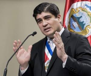 Costa Rican President Carlos Alvarado gives his speech before the the Legislative Assembly after his first year in office, in San Jose, on May 2, 2019. (Photo by Ezequiel BECERRA / AFP)