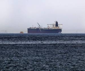 A picture taken on May 13, 2019, shows the crude oil tanker, Amjad, which was one of two Saudi tankers that were reportedly damaged in mysterious 'sabotage attacks', off the coast of the Gulf emirate of Fujairah. - Saudi Arabia said two of its oil tankers were damaged in mysterious 'sabotage attacks' in the Gulf as tensions soared in a region already shaken by a standoff between the United States and Iran. (Photo by KARIM SAHIB / AFP)