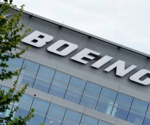 (FILES) In this file photo the Boeing regional headquarters is seen amid the coronavirus pandemic on April 29, 2020, in Arlington, Virginia. - Boeing's chief executive said May 11, 2020, as part of a longer interview that will be broadcast the following day, it was 'most likely' that a major US airline will go out of business due to the massive damage of the coronavirus pandemic on the aviation industry. (Photo by Olivier DOULIERY / AFP)