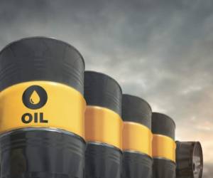 Declining row of crude oil barrels