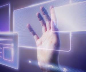Woman touching a smart technology holographic interface
