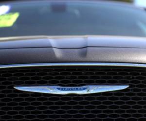 BERKELEY, CALIFORNIA - JUNE 06: The Chrysler logo is displayed on a car at a Chrysler dealership on June 06, 2019 in Richmond, California. Fiat Chrysler announced that it has withdrawn a proposal to merge with French automaker Renault. Justin Sullivan/Getty Images/AFP (Photo by JUSTIN SULLIVAN / GETTY IMAGES NORTH AMERICA / Getty Images via AFP)