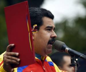 Venezuela enfrenta una degradación económica caracterizada por un déficit fiscal de 20% del PIB. (Foto: AFP)
