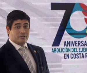 Costa Rican President Carlos Alvarado speaks during a ceremony commemorating the 70th anniversary of the abolition of the Costa Rican army in San Jose on December 01, 2018. (Photo by Ezequiel BECERRA / AFP)
