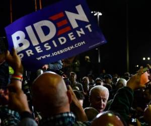 Democratic presidential hopeful former Vice President Joe Biden greets supporters after speaking at a Super Tuesday event in Los Angeles on March 3, 2020. (Photo by Frederic J. BROWN / AFP)