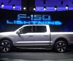 The all-electric F-150 Lightning from Ford is displayed at the Los Angeles Auto Show in Los Angeles, California on November 18, 2021. (Photo by Frederic J. BROWN / AFP)