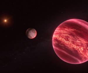 <i>Representación artística que muestra el sistema alrededor de la estrella CD-35 2722, con el objeto recientemente descubierto similar a una luna en el centro.- EFE/ESO/M. Kornmesser</i>