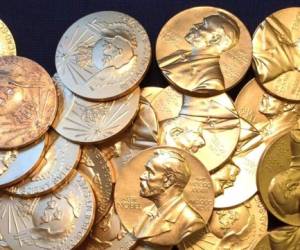 The laureate medal featuring the portrait of Alfred Nobel is seen before a press conference of the Nobel Committee to announce the winner of the 2015 Nobel Medicine Prize on October 5, 2015 at the Karolinska Institutet in Stockholm, Sweden. Swedish inventor and scholar Alfred Nobel, who made a vast fortune from his invention of dynamite in 1866, ordered the creation of the famous Nobel prizes in his will.AFP PHOTO / JONATHAN NACKSTRAND (Photo by JONATHAN NACKSTRAND / AFP)