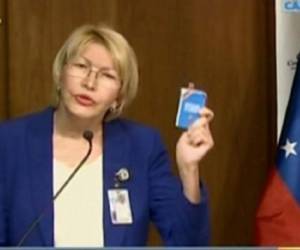 Screen grab from state-owned VTV television broadcast of Venezuela's attorney general Luisa Ortega speaking during the release of her 2016 annual report in Caracas, on March 31, 2017.Venezuela's attorney general surprisingly broke ranks with President Nicolas Maduro on Friday, condemning recent Supreme Court rulings that consolidated the socialist president's power as a 'rupture of constitutional order.' / AFP PHOTO / VTV / HO