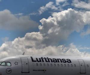 An Airbus aircraft of the German airline Lufthansa is parked at the 'Franz-Josef-Strauss' airport in Munich, southern Germany, on June 11, 2020. - German airline Lufthansa said that it would have to slash 22,000 full-time jobs as it predicts a muted recovery in demand for travel following the coronavirus pandemic. (Photo by Christof STACHE / AFP)