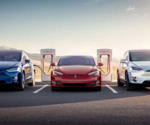 A Tesla car is seen in the Tesla stand during the second China International Import Expo in Shanghai on november 6, 2019. (Photo by HECTOR RETAMAL / AFP)