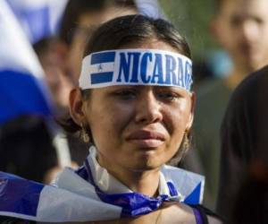 Una estudiante protesta contra el Gobierno de Daniel Ortega durante una marcha ocurrida en junio de 2018 en Managua. Archivo E&N