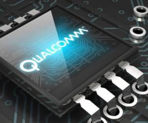 3d illustration of a glowing blue Qualcomm logo sitting on top of a glossy microchip