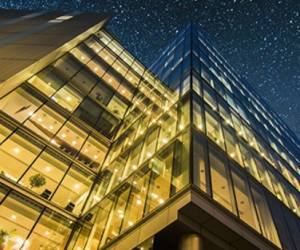 A block of offices at night in London, England.