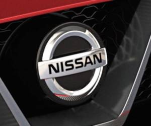 The logo of Nissan is seen at the headquarters of Nissan Motor Corporation in Yokohama on November 20, 2018. - Nissan and Mitsubishi shares plunged on November 20, as the automakers prepared to oust chairman Carlos Ghosn a day after he was arrested for alleged financial misconduct. (Photo by Martin BUREAU / AFP)
