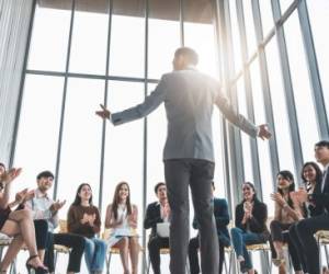 Business people clapping hands during meeting in office for their success in business work