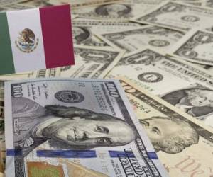 Flag of Mexico sticking in a variety of american banknotes.(series)