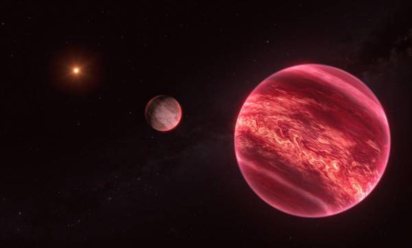 <i>Representación artística que muestra el sistema alrededor de la estrella CD-35 2722, con el objeto recientemente descubierto similar a una luna en el centro.- EFE/ESO/M. Kornmesser</i>