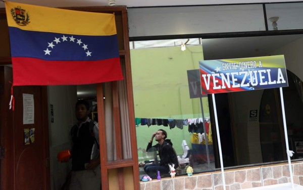 Moody's baja calificación de Venezuela y espera fuertes pérdidas para inversores en bonos