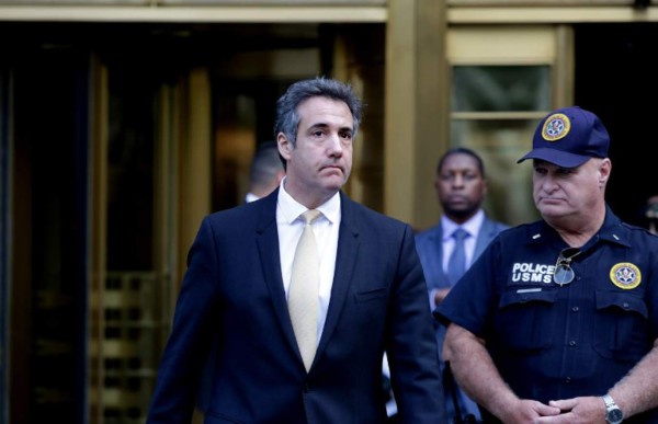 NEW YORK, NY - AUGUST 21: Michael Cohen, former lawyer to U.S. President Donald Trump, exits the Federal Courthouse on August 21, 2018 in New York City. Cohen reached an agreement with prosecutors, pleading guilty to charges involving bank fraud, tax fraud and campaign finance violations. Yana Paskova/Getty Images/AFP