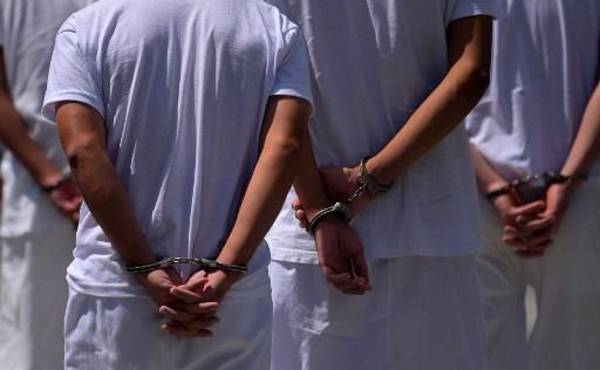 <i>Al menos 46 presos políticos permanecían detenidos hasta mayo de 2026; al menos ocho han muerto bajo custodia desde 2019, según el índice de la OMCT. (Photo by MARVIN RECINOS / AFP)</i>