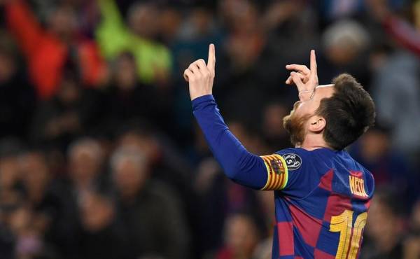 Barcelona's Argentine forward Lionel Messi celebrates after scoring a goal during the UEFA Champions League Group F football match between FC Barcelona and Borussia Dortmund at the Camp Nou stadium in Barcelona, on November 27, 2019. (Photo by Josep LAGO / AFP)