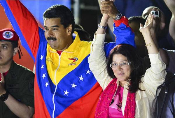 <i>Presidente de Venezuela, Nicolás Maduro, y su esposa, Cilia Flores, durante un acto político en Venezuela. Fueron acusado en Nueva York. FOTO ARCHIVO E&amp;N</i>