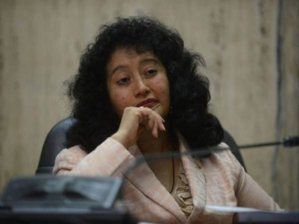 Judge Jasmin Barrios listens during a hearing on reparations for the victims of genocide during Guatemala's civil war, at the Supreme Court in Guatemala City, on May 13, 2013. Former Guatemalan dictator Efrain Rios Montt, who was convicted for being behind the massacre of 1,771 Ixil Maya during his dictatorship, was rushed to a hospital Monday after fainting in court before a hearing on reparations for victims, his lawyer said. The lawyer, Francisco Garcia, said the 86-year-old former general began to suffer from high blood pressure after he was jailed Friday following his 80-year prison sentence for the massacre of indigenous people during his 1982-1983 regime. AFP PHOTO / Johan ORDONEZ