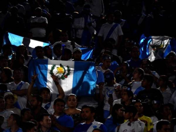 LOS ANGELES, CA - SEPTEMBER 07: Fans hold up flags before the match between Argentina and Guatemala during the first half at Los Angeles Memorial Coliseum on September 7, 2018 in Los Angeles, California. Harry How/Getty Images/AFP