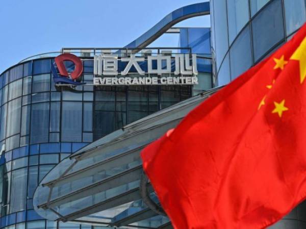 A general view shows the Evergrande Center building in Shanghai on September 22, 2021. (Photo by Hector RETAMAL / AFP) (Photo by HECTOR RETAMAL/AFP via Getty Images)