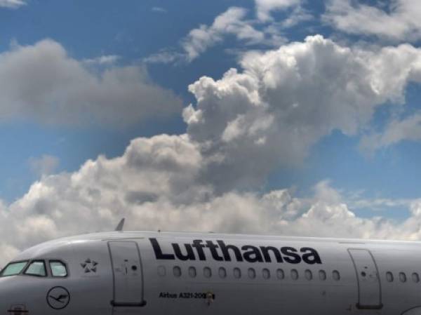 An Airbus aircraft of the German airline Lufthansa is parked at the 'Franz-Josef-Strauss' airport in Munich, southern Germany, on June 11, 2020. - German airline Lufthansa said that it would have to slash 22,000 full-time jobs as it predicts a muted recovery in demand for travel following the coronavirus pandemic. (Photo by Christof STACHE / AFP)